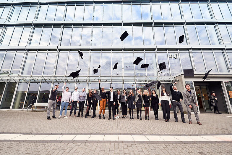 Group photo with graduates at the exhibition/graduation ceremony at the Faculty of Architecture
