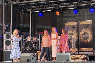 The Graduate Center staff on stage