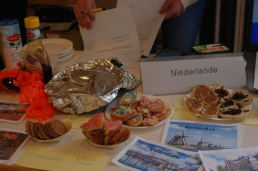 Cultural stand Netherlands: Typical food placed on a table.