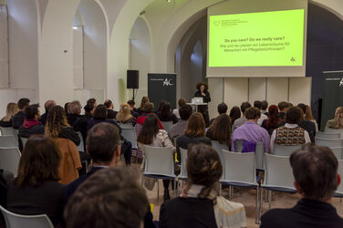 View of the stage and the screen of the Architects Collective Student Award for Healthcare Architecture.