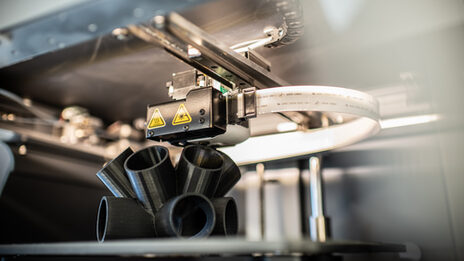 Close-up of a 3D printer during the printing process in the Faculty of Architecture