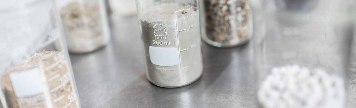Concrete additives in test tubes in the concrete laboratory of the Faculty of Architecture<br>Architecture