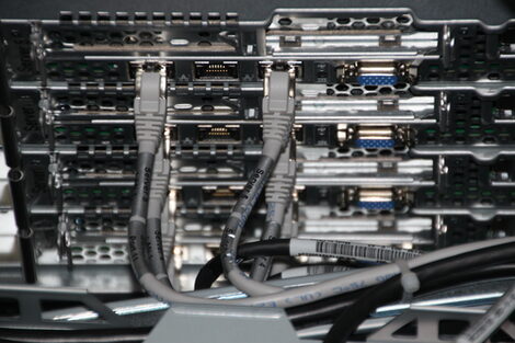 Close-up of various cables and connections of a high-performance computer system
