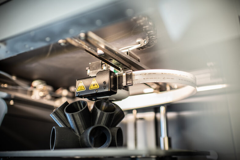 Close-up of a 3D printer during the printing process in the Faculty of Architecture