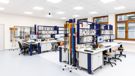 Photograph of the laboratory for electrical machines with a wide range of equipment.