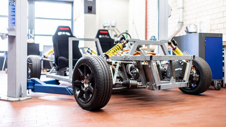 Photo of the hybrid vehicle as a master project in the workshop.