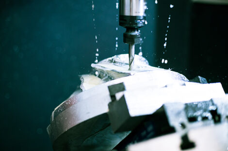 Close-up of a milling machine in use,