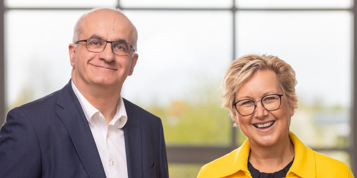 Two people next to each other